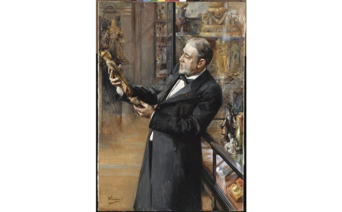 Portrait peint de Guimet inspectant un objet d'art