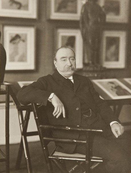 Photograph of Isaac de Camondo, sitting on a chair, looking at the camera