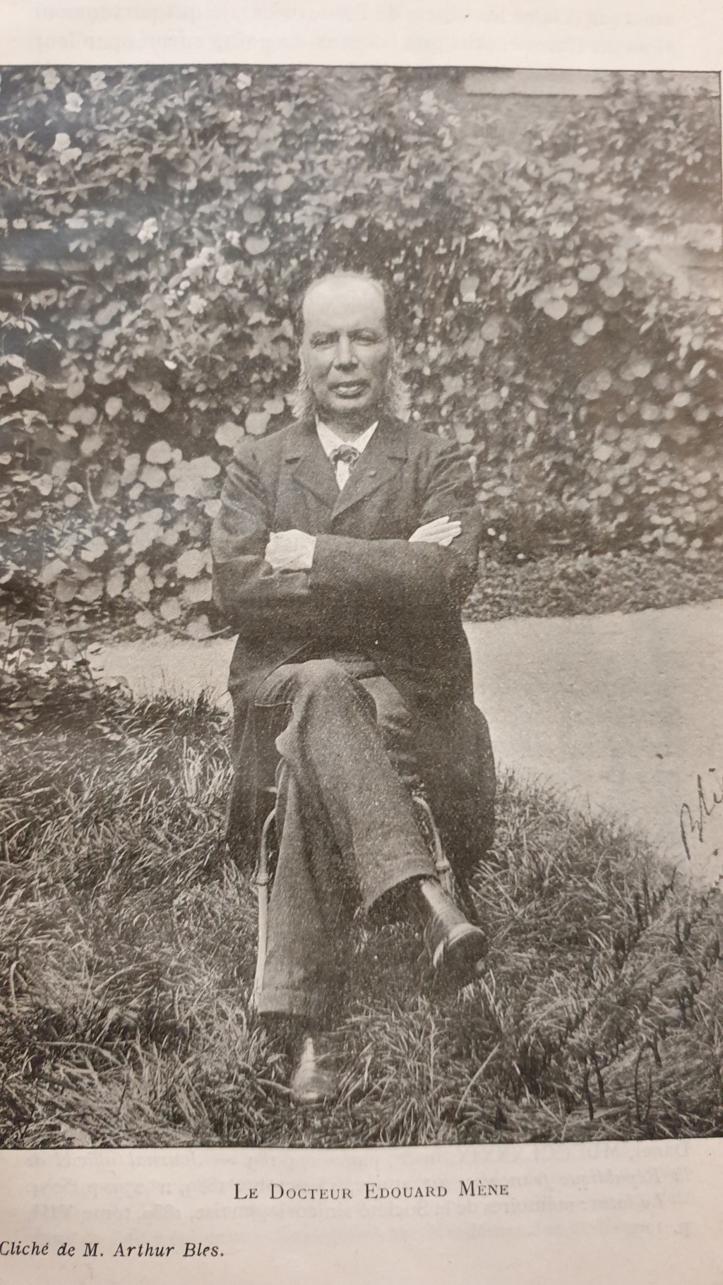 Black and white photograph of Edouard Mène in his garden